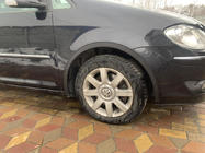 Volkswagen Touran 2003–2010 Obrobe kolotekov (4 kosi, črne) 2006-2010, kovinske fotografija 4
