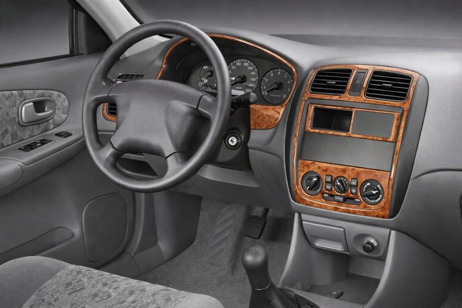 Mazda 323 1977–2003 Okrasne obloge armaturne plošče (2000-2004) Image
