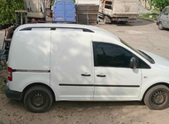 Volkswagen Caddy 2010–2015 Strešni relingi Skyport BLACK Standardna baza fotografija 6