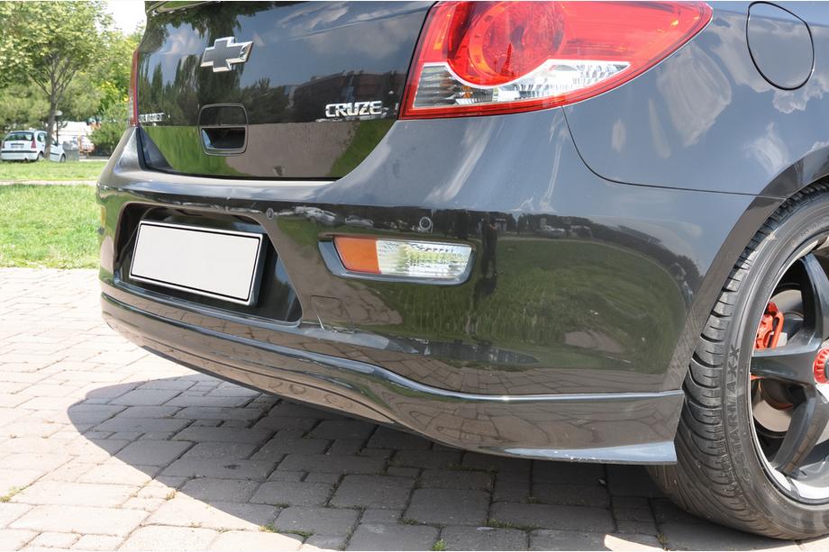 Chevrolet Cruze 2009–2015 Dodatek zadnjega odbijača HB (Meliset, za lakiranje) Image