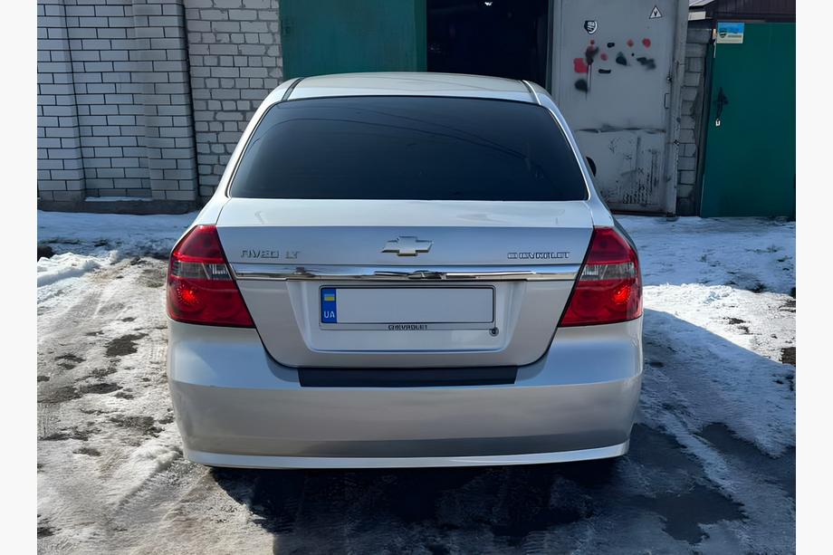 Chevrolet Aveo T250 2005–2011 Plastična obloga zadnjega odbijača z zavihkom Image