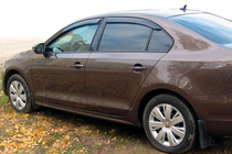 Volkswagen Jetta 2011–2018 Deflektorji oken (4 kosi, HIC) fotografija 5