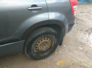 Suzuki Grand Vitara 2005–2017 Obrobe kolotekov (4 kosi, črne) fotografija 2