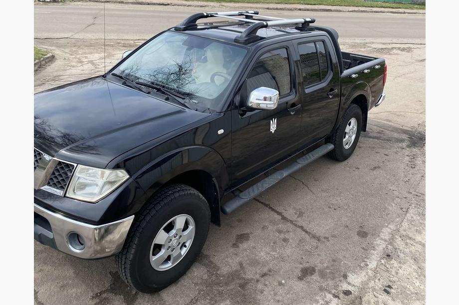 Nissan Navara 2006–2015 Strešne sani s prečkami (2 kosa, krom) Image