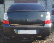 Renault Logan I 2005–2008 Okrasna letev spodnjega roba pokrova prtljažnika (nerj. jeklo) fotografija 5