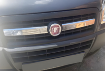 Fiat Doblo I 2005–2010 Okrasne letvice za masko hladilnika (2-delni, nerjaveče jeklo) Carmos - turško nerjaveče jeklo fotografija 1