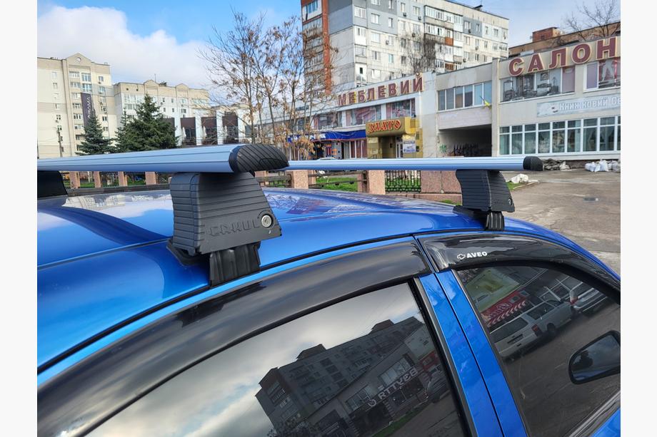 Chevrolet Aveo T250 2005–2011 Prečke za gladko streho (2 kos, Asaf V4) Image