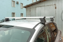 Skoda Octavia II A5 2006–2010 Prečke za gladko streho (2 kos, Asaf V4) fotografija 1
