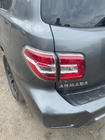 Nissan Armada 2016–2024 Zadnji odbijač komplet (original 2019) fotografija 5