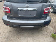 Nissan Armada 2016–2024 Zadnji odbijač komplet (original 2019) fotografija 4