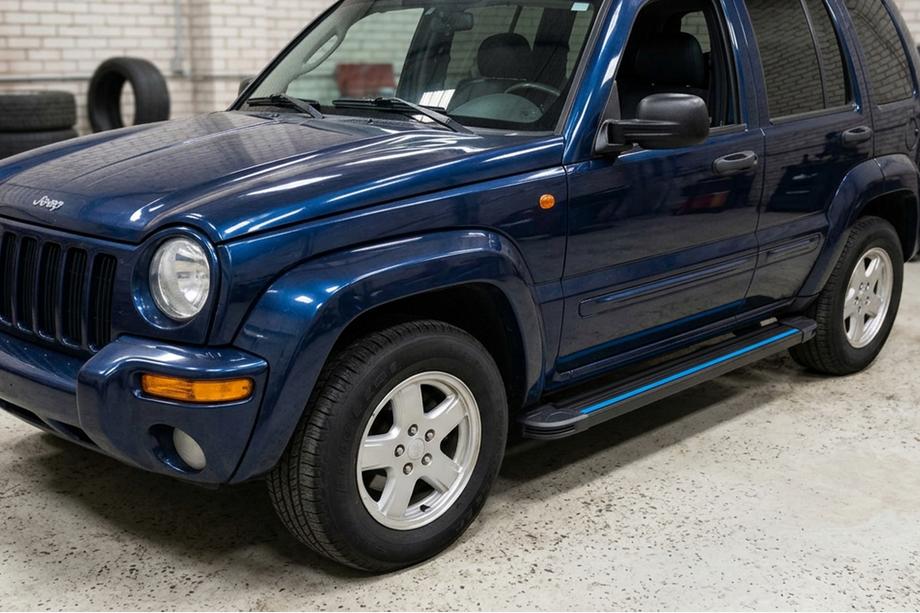 Jeep Cherokee/Liberty 2002–2007 Bočne stopnice Maya Blue (2 kos, aluminij) Image