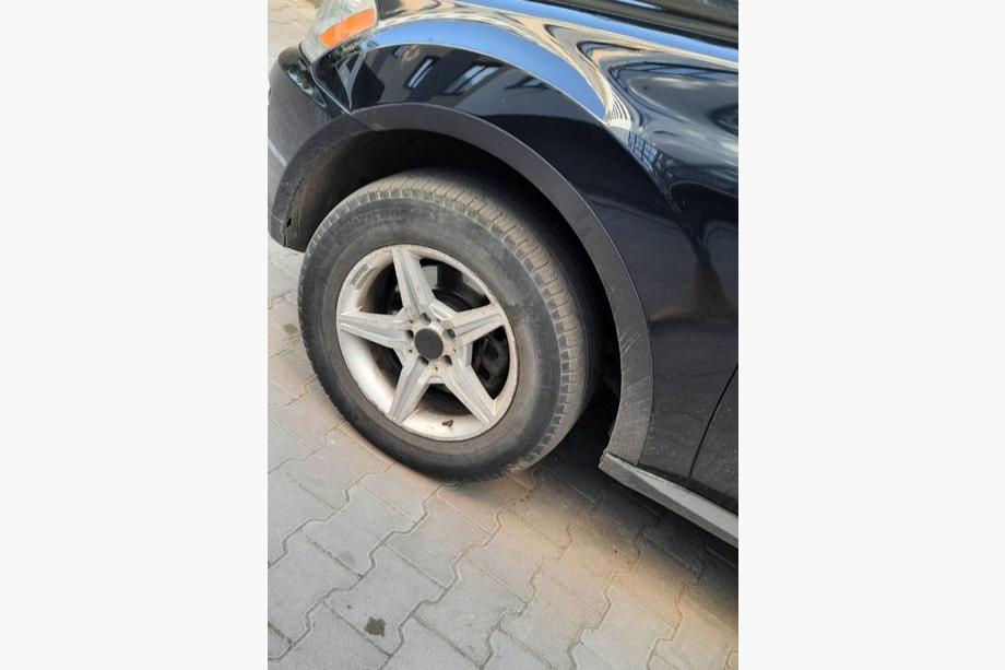 Mercedes ML W164 2005–2011 Obrobe kolotek (4 kosi, črne, ABS plastika) Fotografija 3
