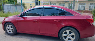Chevrolet Cruze 2009–2015 Vetrni deflektorji za okna s kromirano okrasno letvijo (4 kosi, Sunplex Chrome) fotografija 1