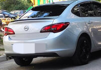 Opel Astra J 2009–2015 Sedan lip spojler (Sunplex, črn) (115 cm x 5,5 cm) fotografija 1