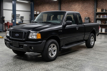Ford Ranger 2002–2006 Stranski pragovi Tayga Black (2 kos, aluminij) fotografija 1