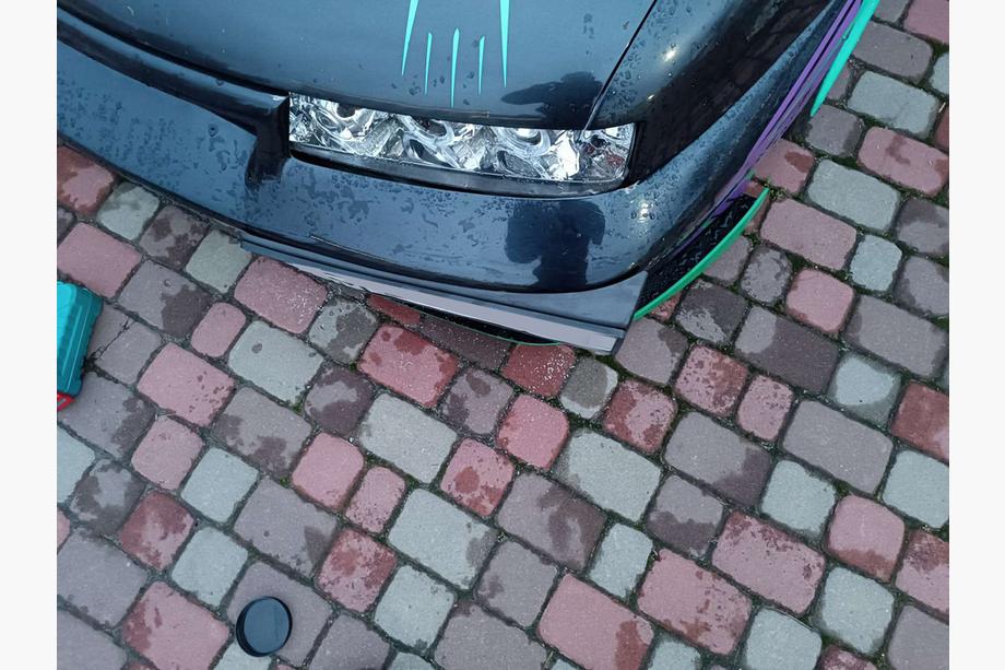 Univerzalni nosilec registrske tablice za rob odbijača (plastika) Fotografija 5